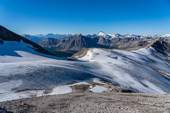 Descending the SW aspect of Deluc to the glacier.