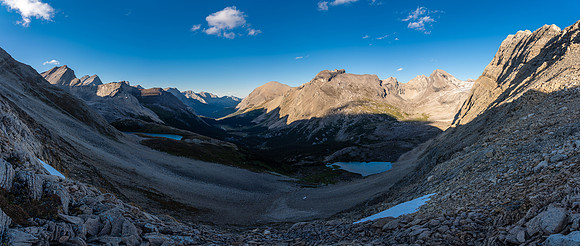 First views over the 2nd col to the high and low bivy lakes and Deluc Mountain at distant right.