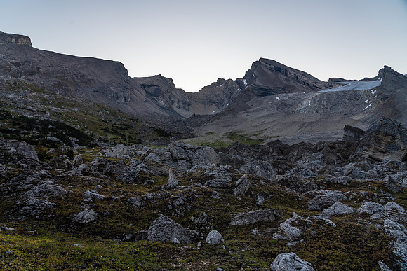 Crossing a boulder field on route to a distant Deluc Mountain.