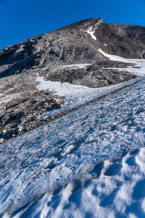 Descending the easy Deluc Glacier back to the lower bivy lake.