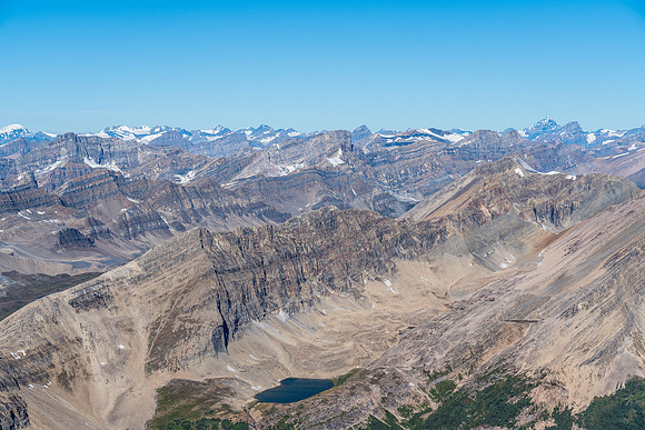 View over the upper bivy lake with the approach col at lower fg left. Watermelon at mid center.
