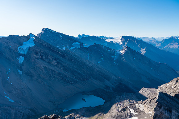 Little and "Big" Cataract Peaks rise above Rock Isle or Three Brothers Lake.
