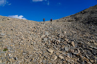 A steep grunt from the tarn to the top of the col.
