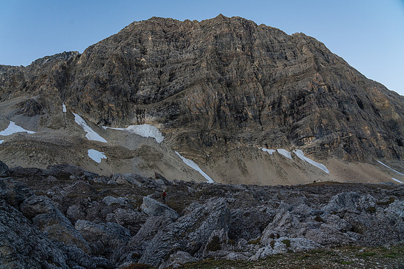 Crossing a boulder field on route to a distant Deluc Mountain. Find Cornelius in the photo.