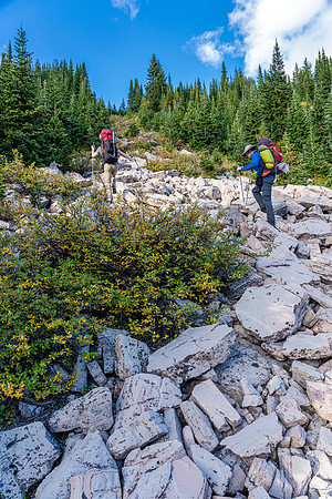 Using a rocky drainage to assist our second steep ascent with big packs.