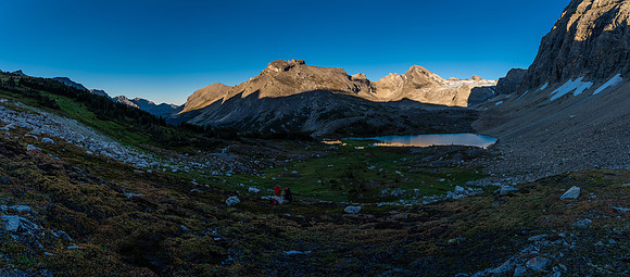 Surveying our slice of paradise near the low bivy lake. Deluc in sunshine at c-r.