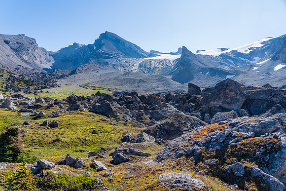 Gorgeous alpine terrain on a warm September morning. Deluc rising at center.
