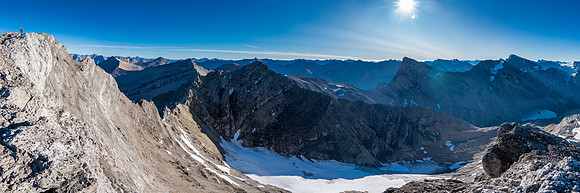 Cornelius nears the summit of Deluc with Little Cataract and Three Brothers Lake at right.