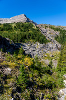 A waterfall runs from the high bivy lake into the north valley.