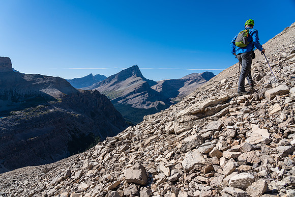 Cornelius starts the scree ascent of Dip Slope's SW face.