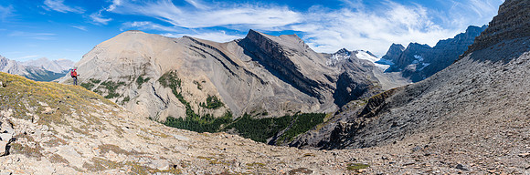 Mike takes in the view - our traverse route looking tamer than it is at right.