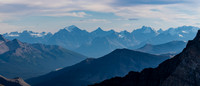 Lake Louise peaks including Mount Temple and Huber in the hazy distance.