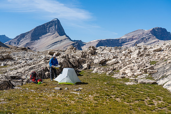 A perfect bivy site, relatively flat and protected from rock fall. South Tower and Harris in the bg.