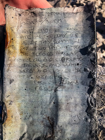 An original summit register from Graeme Pole's FRA in 1990! Soaking wet unfortunately...