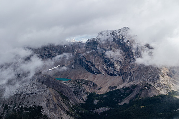 Little Cataract rises over Three Brothers Lake.