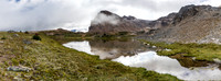 A small, unexpected tarn at the bottom of Minnow Peak's west scree slopes.