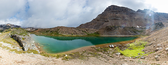 A small, unexpected pond at the bottom of Minnow Peak's west scree slopes.