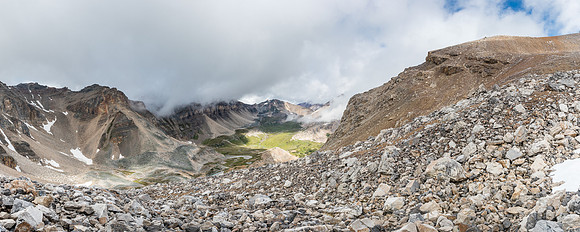 Much higher than the approach meadows now. The summit out of sight at right.