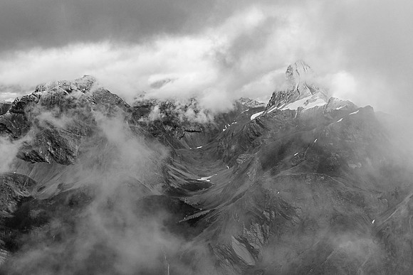 Cataract Peak looms in clouds across the Pipestone River.