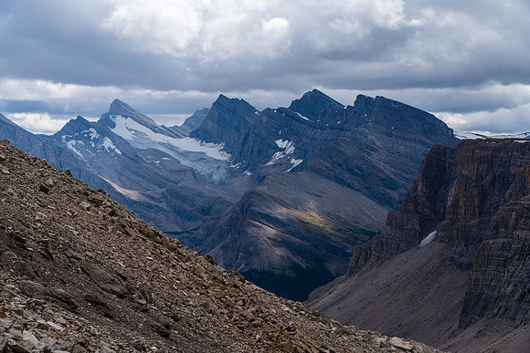 Views back towards Deluc Mountain and the Three Brothers as the sky clouds up.