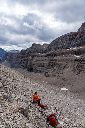 Taking a break part way up the huge rubble slope. The complex curtain wall holds our attention.