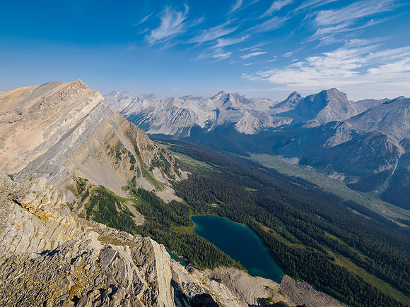 Views up the Pipestone River past Minnow Peak towards a distant Mount Willingdon.