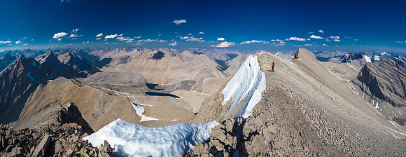 Phil traverses towards the summit with this stunning view north over the Roaring Creek Valley.