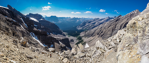 Looking back at Phil as we near the end of the first traverse. Note the loose, light colored blocky and bouldery terrain.
