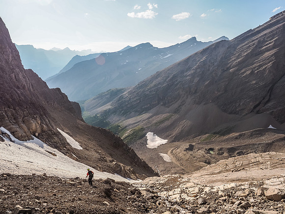 After the slabby watercourse we make for the convenient snow in the lower ascent gully.