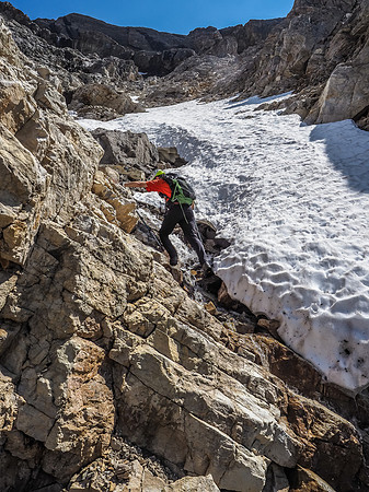 Phil gets ready to cross the drainage as we will start our first traverse out of sight to the left.