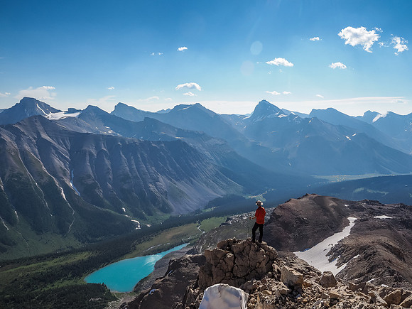 Phil gazes over the Pipestone River Valley and a gorgeous tarn towards Deluc Peak at left.
