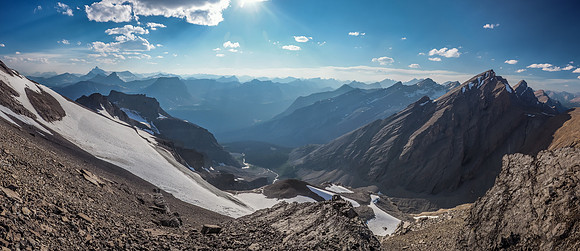 Nearing the glacier with great evening views over our bivy and approach valley.