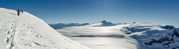 High on the summit ridge of Androlumbia with gorgeous, clear views over the ice fields towards Mount Columbia (C) and Snow Dome (R).