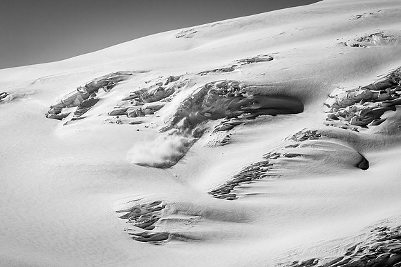 A large ice avalanche comes off the south side of Snow Dome across the glacier from our ascent route.