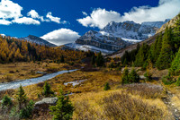 As the trail starts following Skoki Creek towards Myosotis Lake the scenery gets very dramatic with Packer's Pass Peak on the left and Ptarmigan on the right.