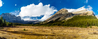 As quickly as the storm moved in, it moved out again. Looking back at Pipestone (L) and Drummond (R) as we start the slog back to camp.