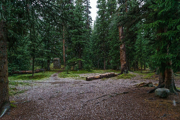 The steady drizzle changes to snow just before we leave camp.