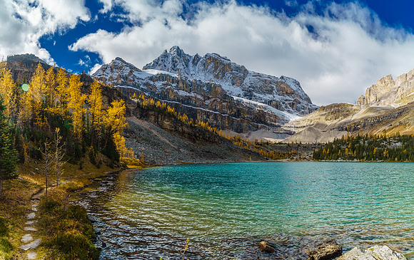 Myosotis Lake with the trail running alongside on the left, Ptarmigan looming on the left.