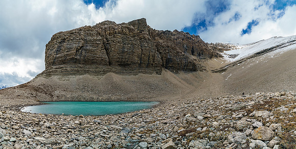 Drummond Tarn with the long, foreshortened ascent gully to the false summit on the right.
