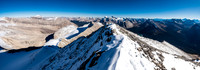 Mount Drummond at left and the Skoki area at right and center in this view south down the summit ridge.