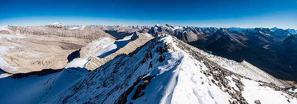 Mount Drummond at left and the Skoki area at right and center in this view south down the summit ridge.