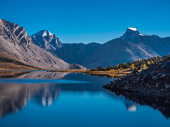 Mount Douglas and St. Bride reflect in Ptarmigan Lake.