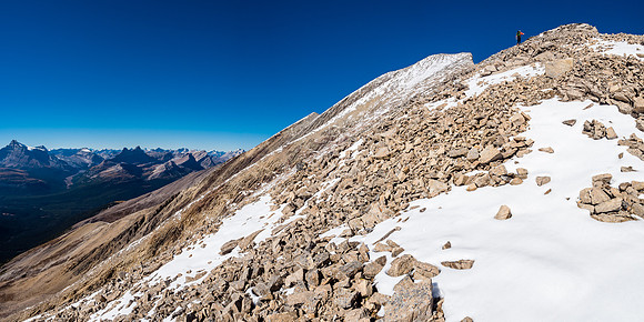 Phil traverses and ascends to the summit of Cyclone Mountain from the false summit.