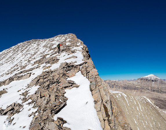 Significant exposure down the east face with Mount Drummond now visible at right.