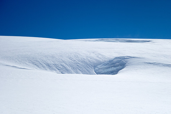 Some pretty big holes as we work our way around the west shoulder of Snow Dome.