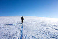 TJ leads up easy slopes to the summit of Kitchener.