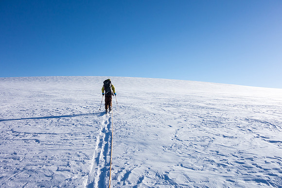 TJ leads up easy slopes to the summit of Kitchener.