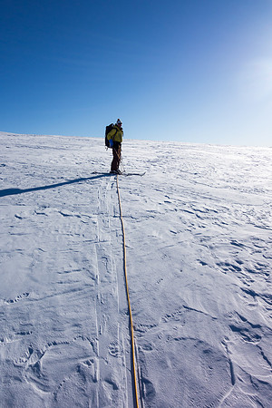 TJ leads up easy slopes to the summit of Kitchener.