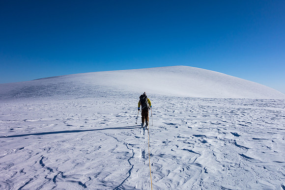 TJ skis to the summit block of Kitchener.