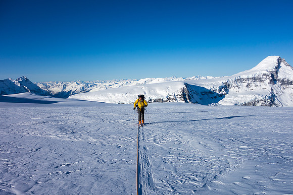 Ian skiing up Kitchener with Mount Columbia in the background. It's only 09:00 but very warm already.